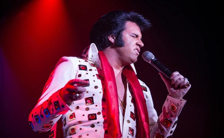 Travis Powell as Elvis